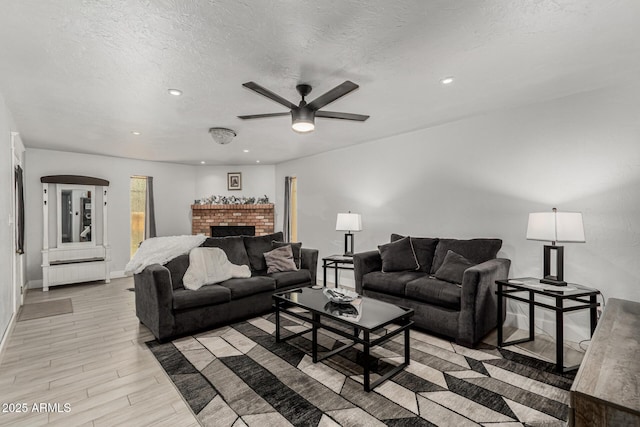 505 S S Rdg, Mesa, AZ 85204 - living area with a ceiling fan, radiator heating unit, a textured ceiling, light wood-style floors, and recessed lighting