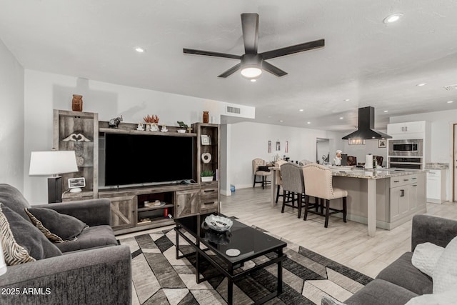 505 S S Rdg, Mesa, AZ 85204 - living room featuring ceiling fan, recessed lighting, and light wood-type flooring
