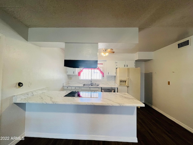 kitchen featuring white cabinetry, kitchen peninsula, dishwasher, white fridge with ice dispenser, and sink