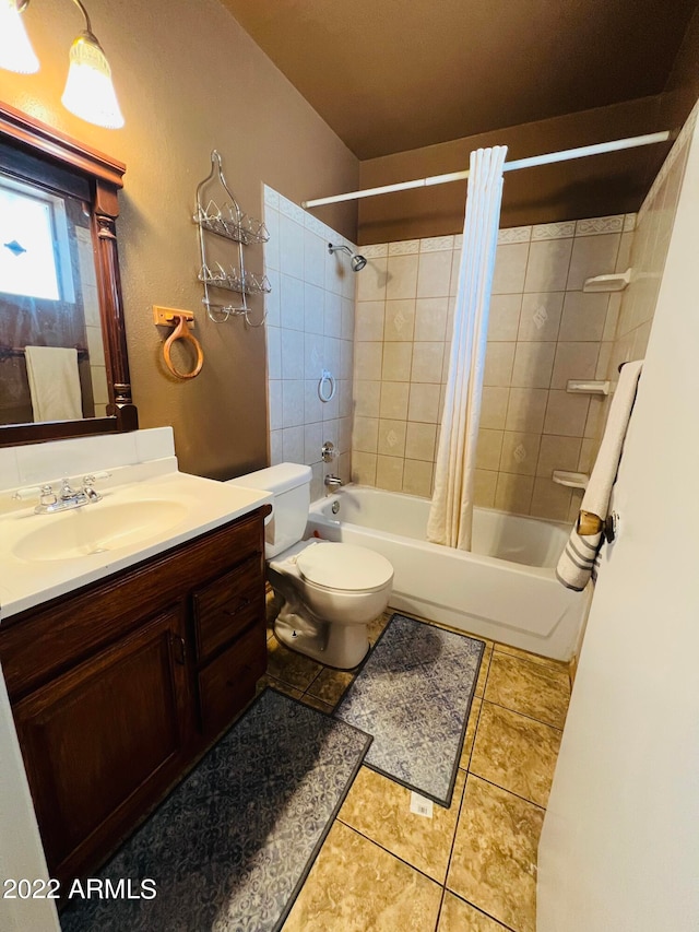 full bathroom with shower / bath combination with curtain, tile patterned flooring, vanity, and toilet