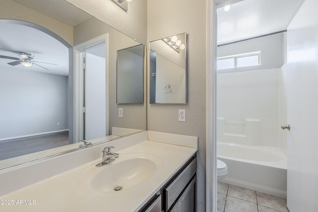 16077 W Larkspur Dr, Goodyear, AZ 85338 - full bath with a ceiling fan, toilet, vanity, and tile patterned flooring