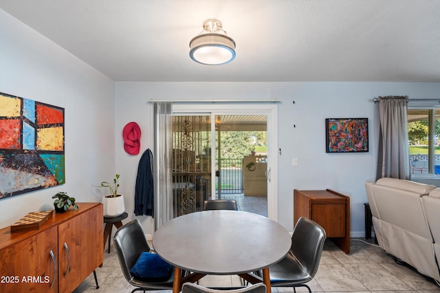 dining room with light tile patterned floors