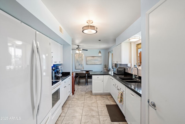 kitchen featuring ceiling fan, sink, light tile patterned flooring, white appliances, and white cabinets