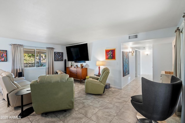 living room featuring light tile patterned floors