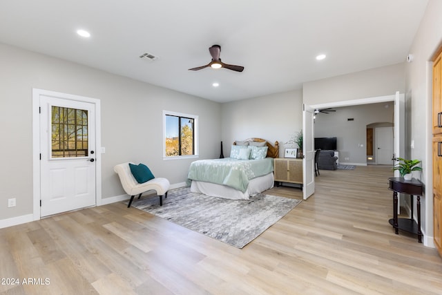 bedroom featuring ceiling fan and light wood-type flooring