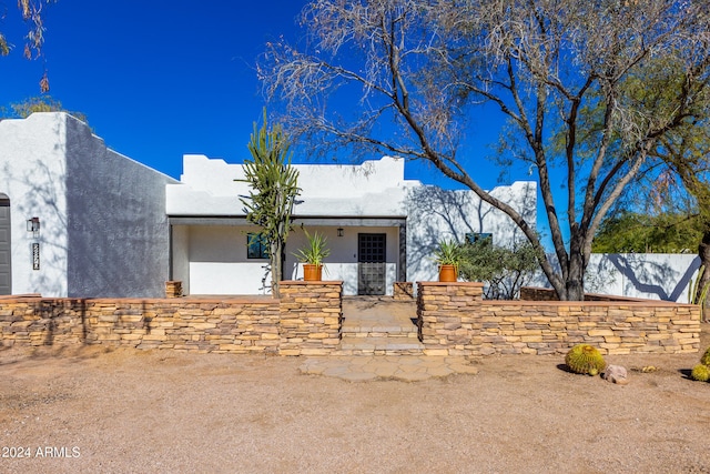 view of pueblo-style home