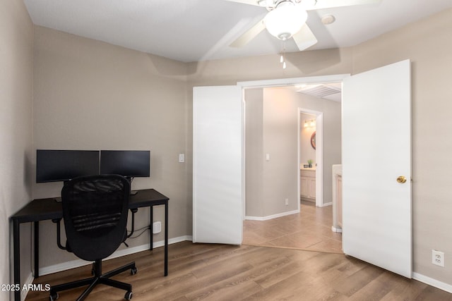 office featuring ceiling fan and light hardwood / wood-style flooring