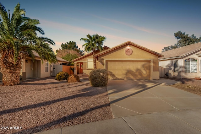 view of front of property with a garage