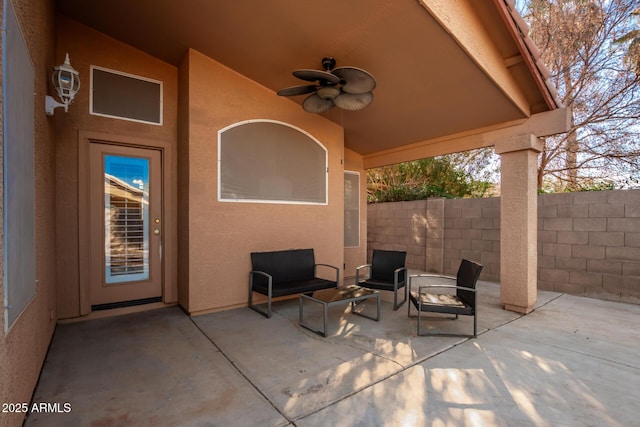 view of patio / terrace featuring ceiling fan