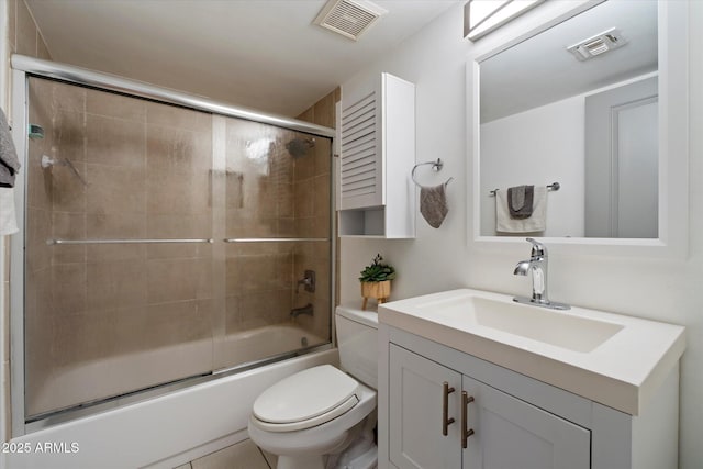 7430 E Chaparral Rd Unit A222, Scottsdale, AZ 85250 - bathroom featuring toilet, bath / shower combo with glass door, and vanity