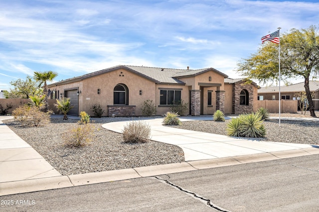 view of front of property with a garage