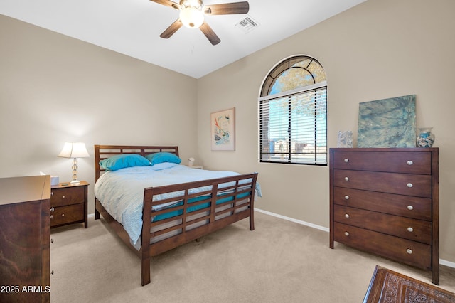 bedroom featuring ceiling fan and light carpet