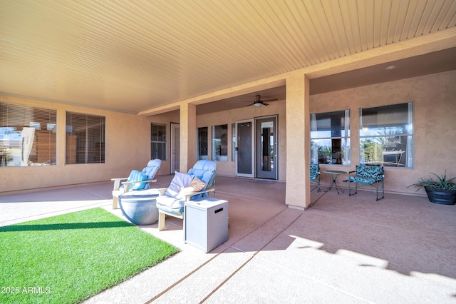 view of patio with ceiling fan