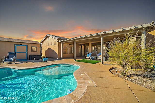 pool at dusk featuring a jacuzzi and a patio