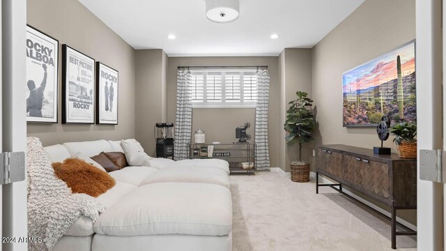 interior space with carpet flooring and recessed lighting