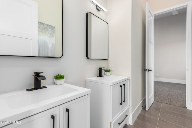 bathroom featuring vanity and tile patterned flooring