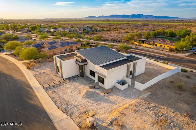 drone / aerial view featuring a mountain view