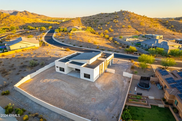 drone / aerial view featuring a mountain view