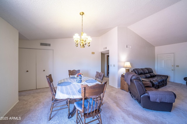 17810 N 34th Pl, Phoenix, AZ 85032 - dining area featuring lofted ceiling, a chandelier, and light colored carpet