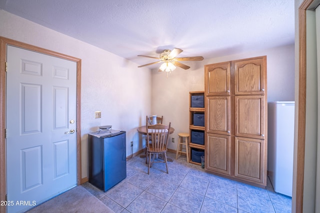 17810 N 34th Pl, Phoenix, AZ 85032 - home office with a ceiling fan, a textured ceiling, and light tile patterned floors