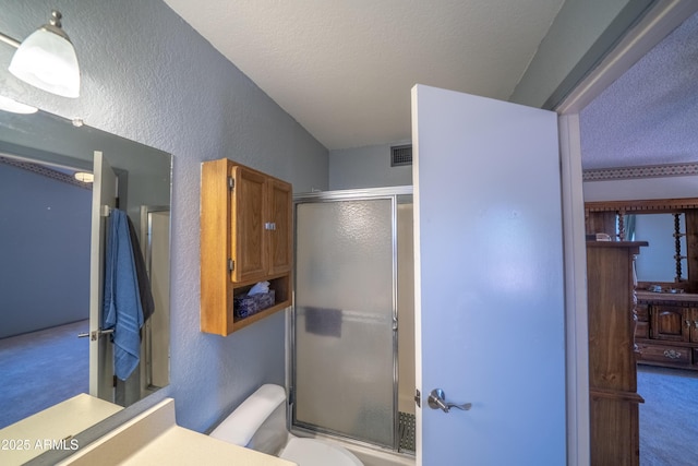 17810 N 34th Pl, Phoenix, AZ 85032 - full bathroom featuring a textured wall, an enclosed shower, a textured ceiling, and vanity