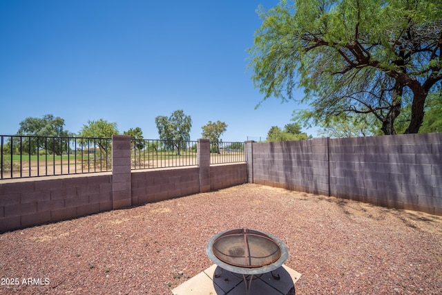 17810 N 34th Pl, Phoenix, AZ 85032 - fenced backyard featuring a fire pit