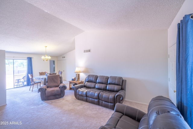 17810 N 34th Pl, Phoenix, AZ 85032 - living room with a textured ceiling, carpet floors, a chandelier, and vaulted ceiling