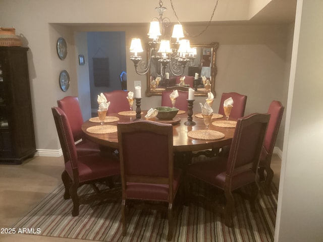1036 E Wagon Wheel Dr, Phoenix, AZ 85020 - dining room with a chandelier and baseboards