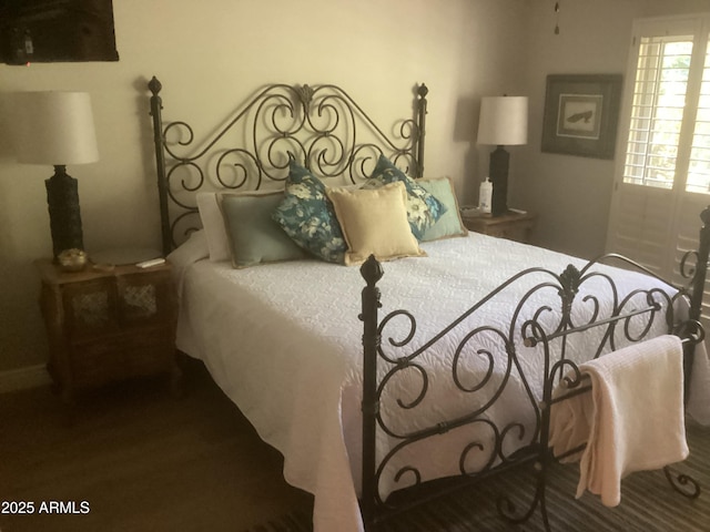 1036 E Wagon Wheel Dr, Phoenix, AZ 85020 - bedroom with wood finished floors