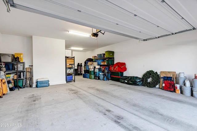 garage featuring a garage door opener