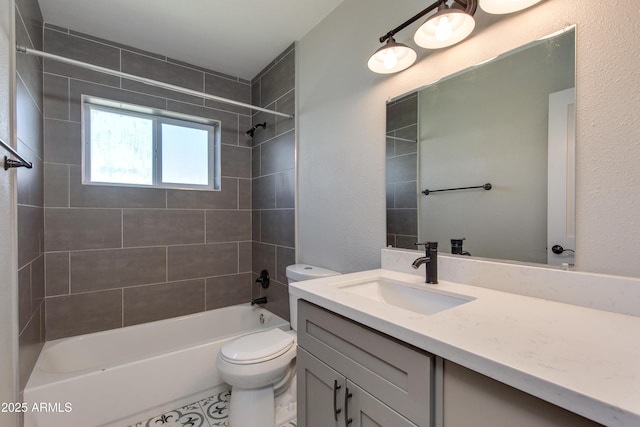 bathroom featuring toilet, vanity, and shower / bath combination