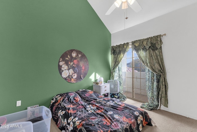 carpeted bedroom featuring lofted ceiling and ceiling fan