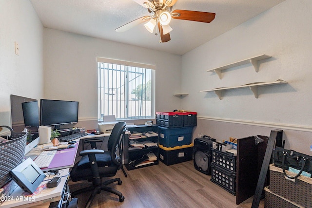 office space featuring hardwood / wood-style floors and ceiling fan