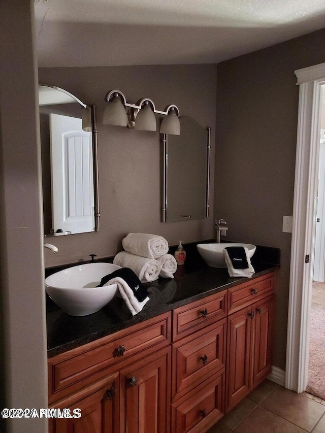 bathroom with vanity and tile patterned floors