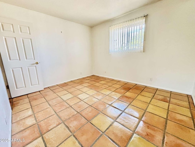 view of tiled empty room