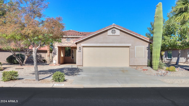 view of front of home with a garage