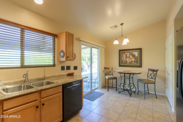 kitchen with vaulted ceiling, sink, pendant lighting, dishwasher, and light tile patterned flooring