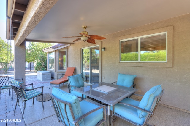 view of patio / terrace featuring ceiling fan