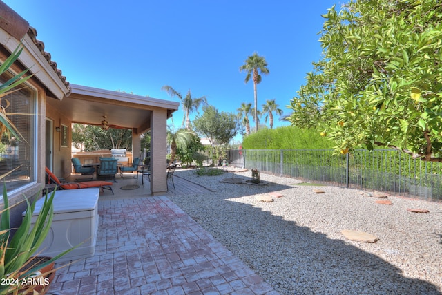 view of patio with ceiling fan