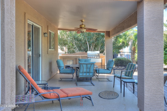 view of patio / terrace featuring ceiling fan