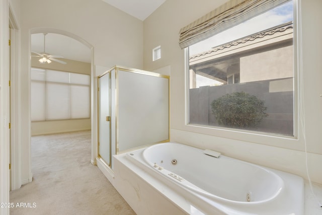 bathroom featuring independent shower and bath and ceiling fan