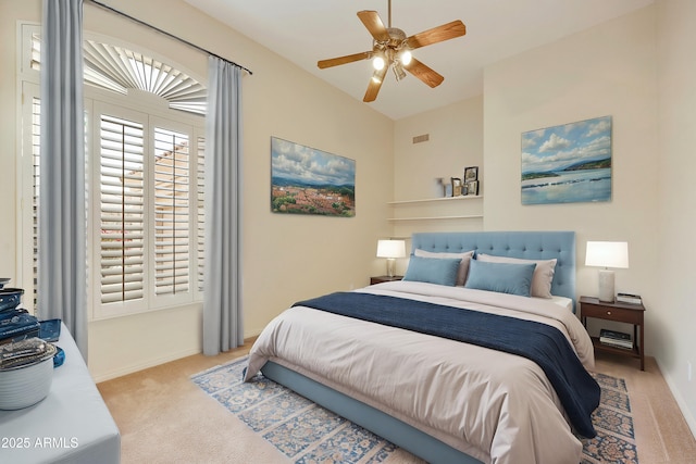 carpeted bedroom with ceiling fan