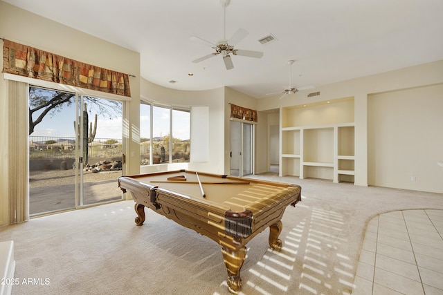 recreation room with light carpet, built in features, ceiling fan, and billiards