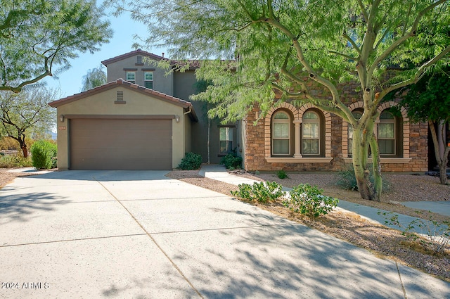 view of front of property with a garage