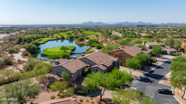 bird's eye view with a water and mountain view