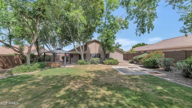 5733 E Jaeger St, Mesa, AZ 85205 - back of house featuring a gazebo, a patio area, a fenced backyard, and stucco siding