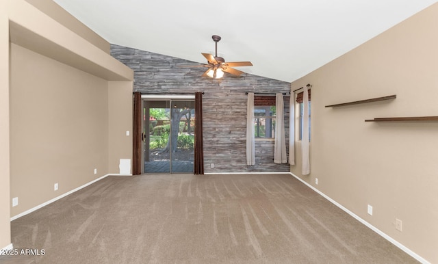 5733 E Jaeger St, Mesa, AZ 85205 - spare room featuring vaulted ceiling, a ceiling fan, and carpet