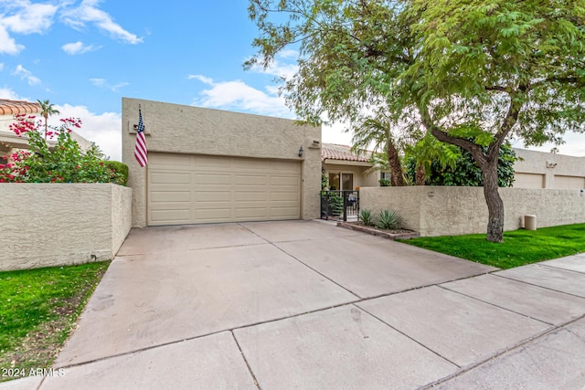 view of front of home with a garage