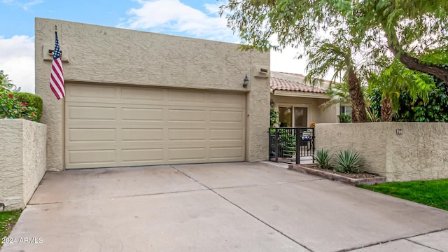 view of front of property with a garage