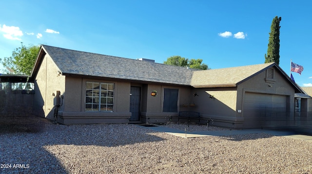 ranch-style house with a garage